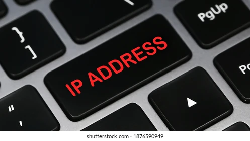 A keyboard showing red text that reads "IP Address."