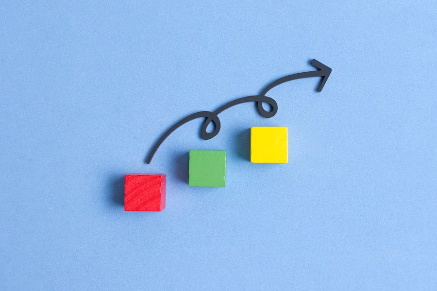 Curved line leaping over vibrant cubes